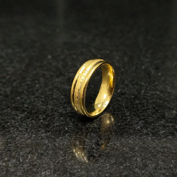 Ferrum ring in golden color in pakistan with polished smooth finish and detailed engravings by Lamha