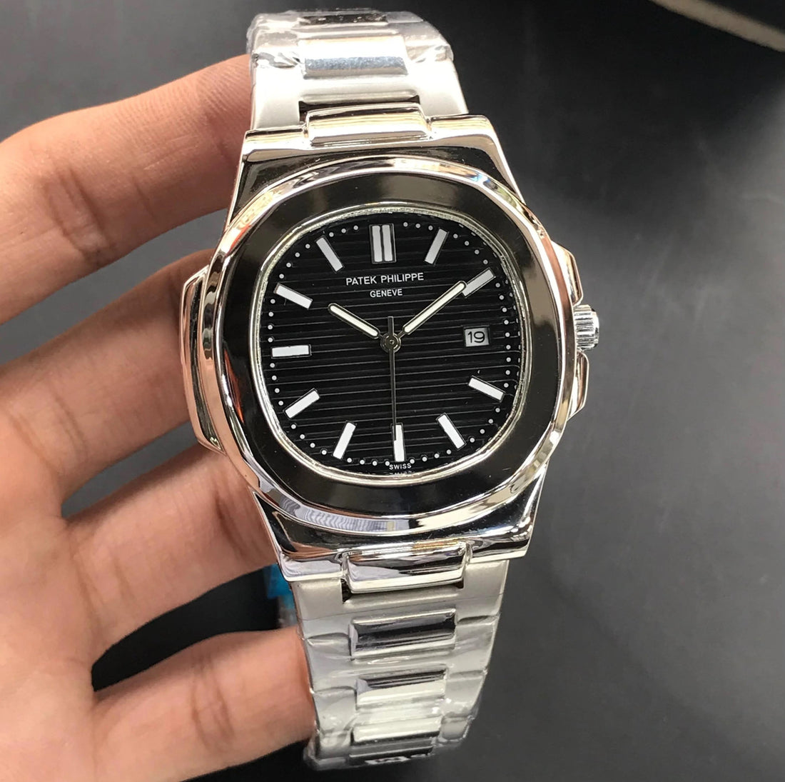 Patek Philippe Watch in Silver Black Color with stainless steel bracelet and black dial showing date