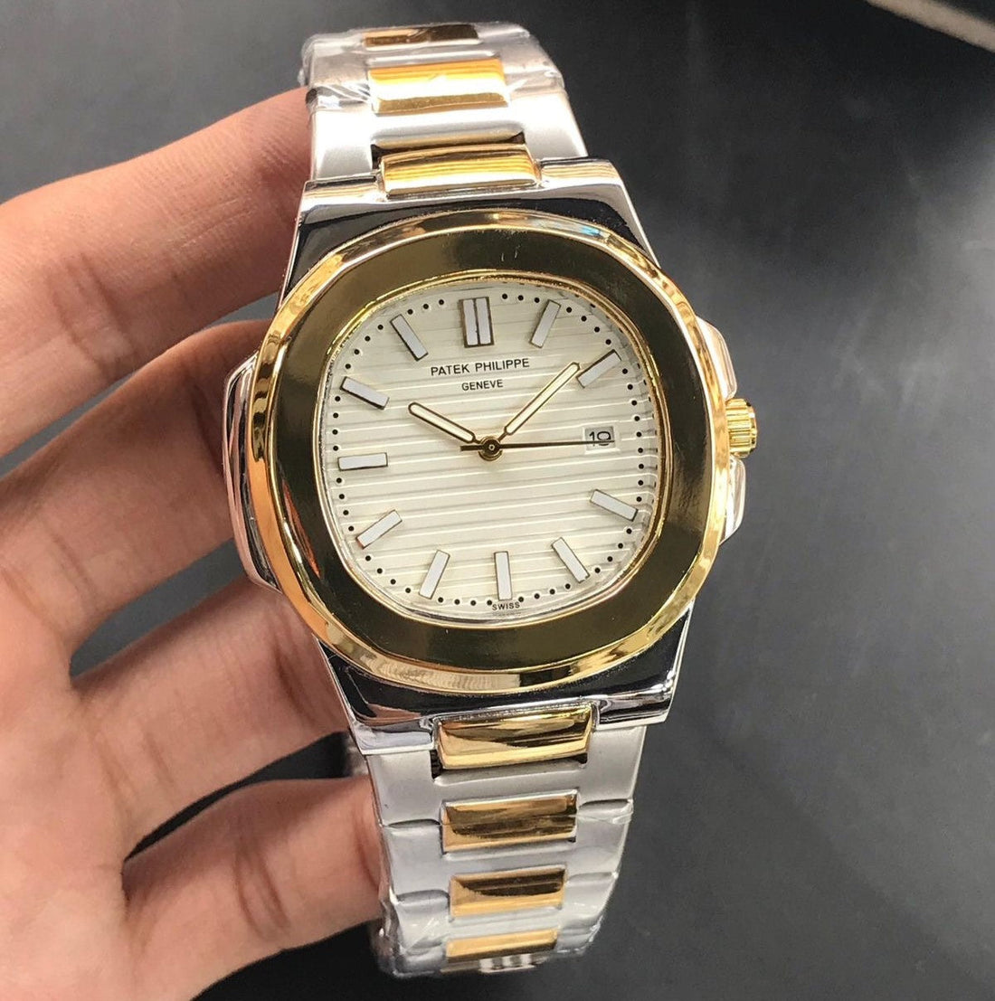 Patek Philippe Watch Two Tone White in Pakistan showing gold and silver bracelet with white dial and date display
