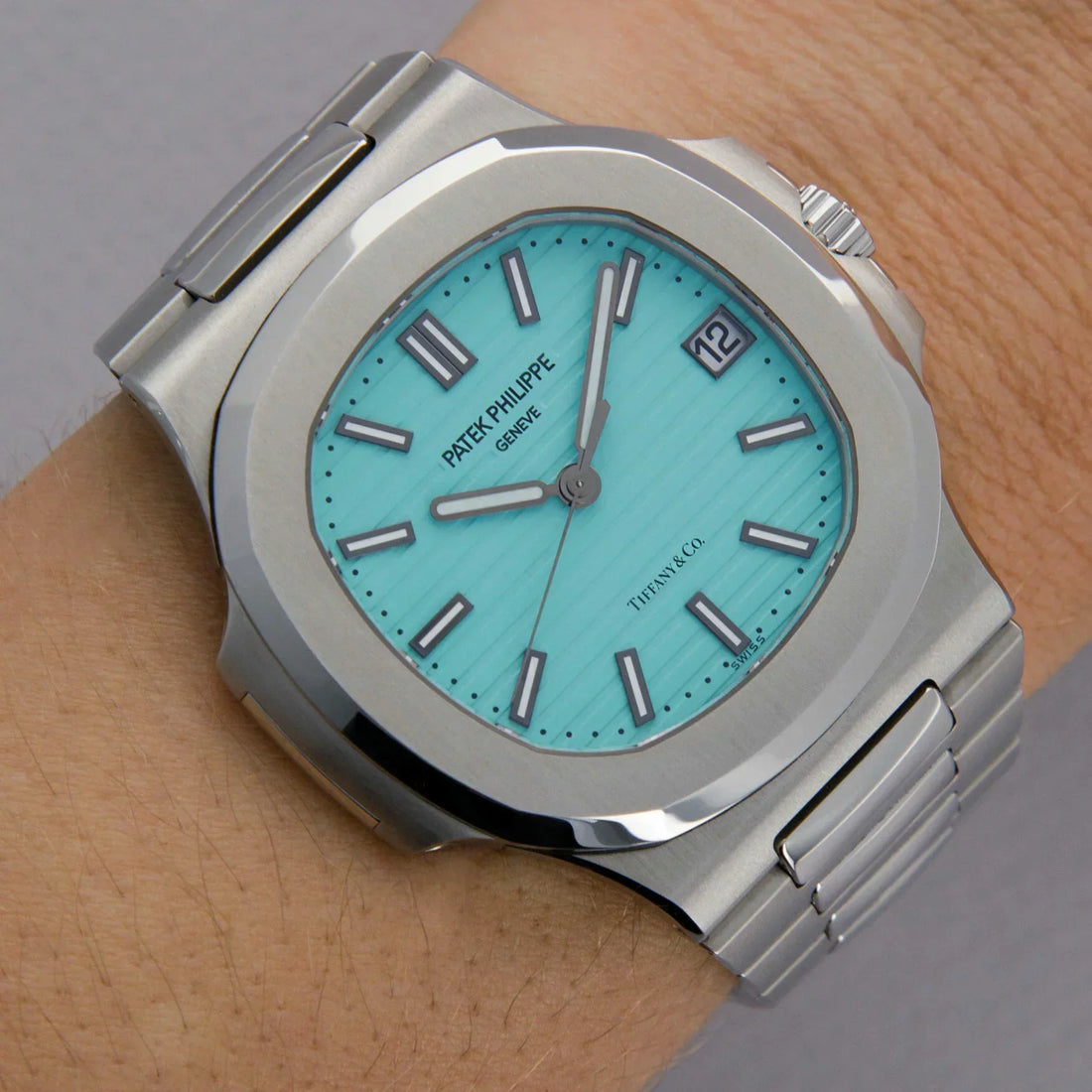 Patek Phillipe Silver Tiffany wristwatch with turquoise dial and stainless steel bracelet by Lamha