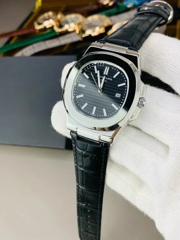 Lamha Petek philippe Silver black strap watch with a sleek silver case and black dial