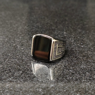 Silver Egyptian ring for men with black stone and intricate beaded side detailing