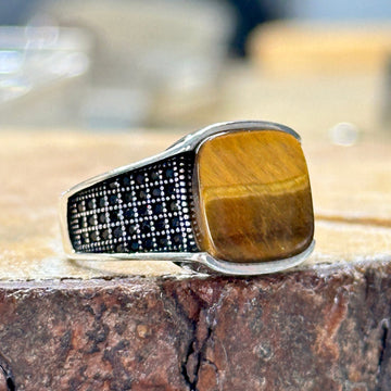Turkish onyx riger ring for men in pakistan with a brown stone and detailed metal band