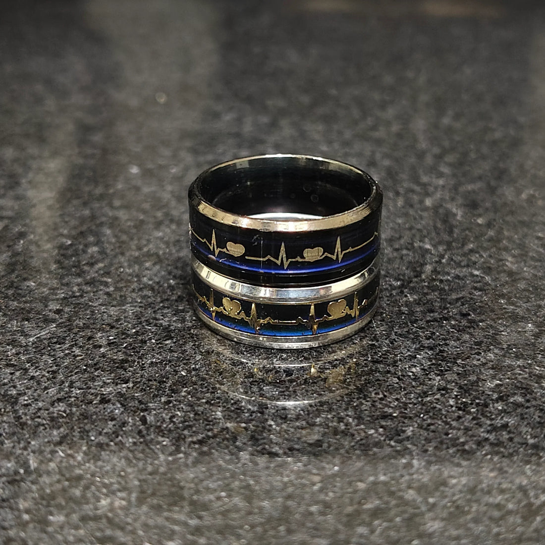 Stylish 2 heart beat rings for men in pakistan featuring black and silver tones with heartbeat design