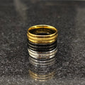 Set of 3 ferrum rings in Pakistan by Lamha featuring gold black and silver metallic finish