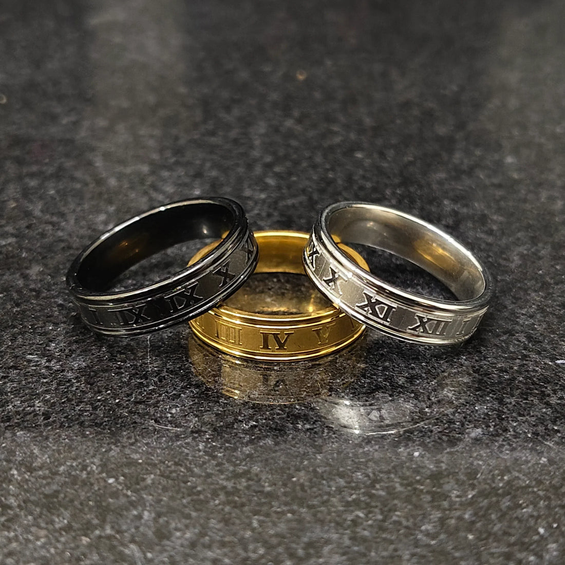 Set of 3 roman rings for men in pakistan by Lamha in black silver and gold colors with engraved Roman numerals