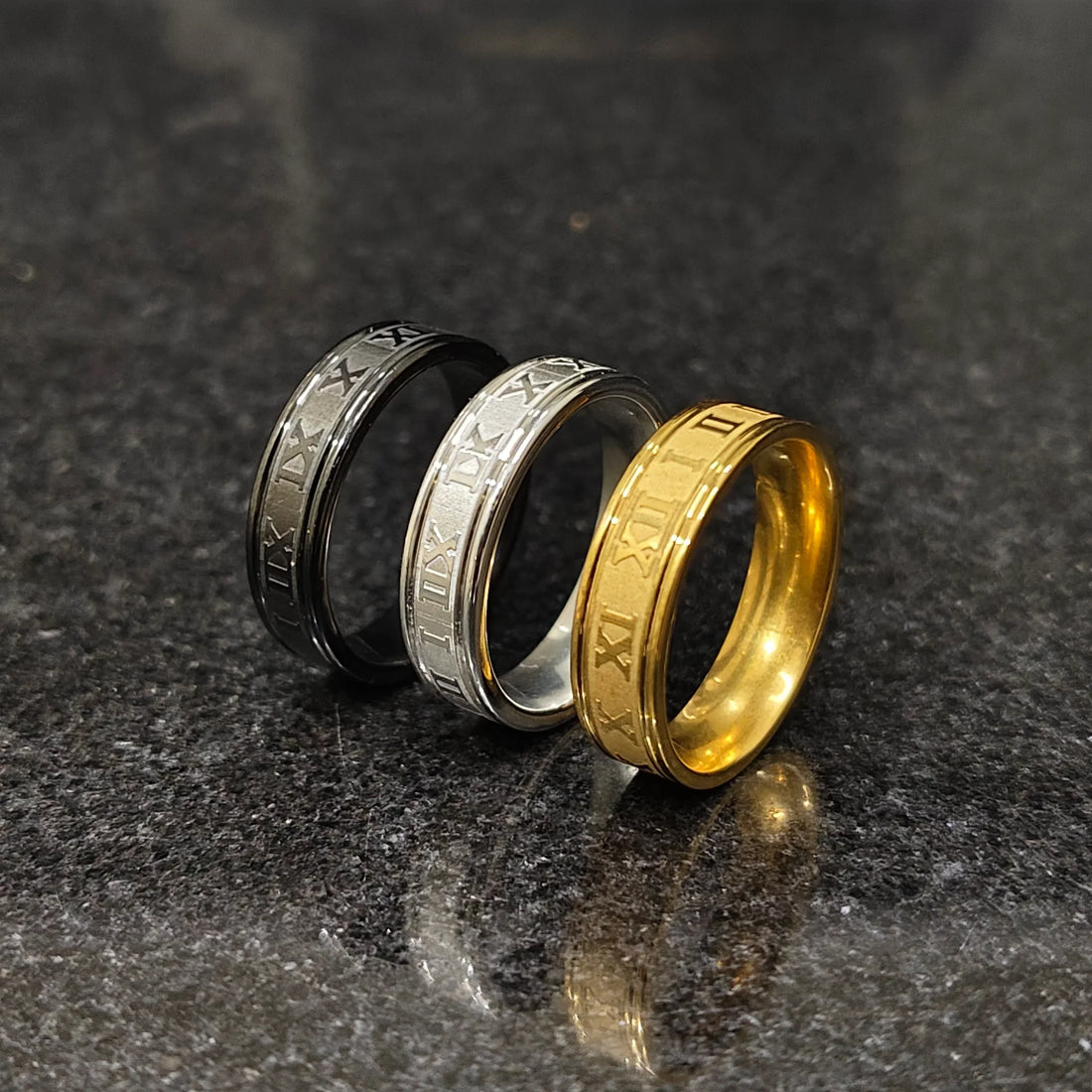 Set of 3 roman rings for men in pakistan by Lamha in black silver and gold colors with engraved Roman numerals