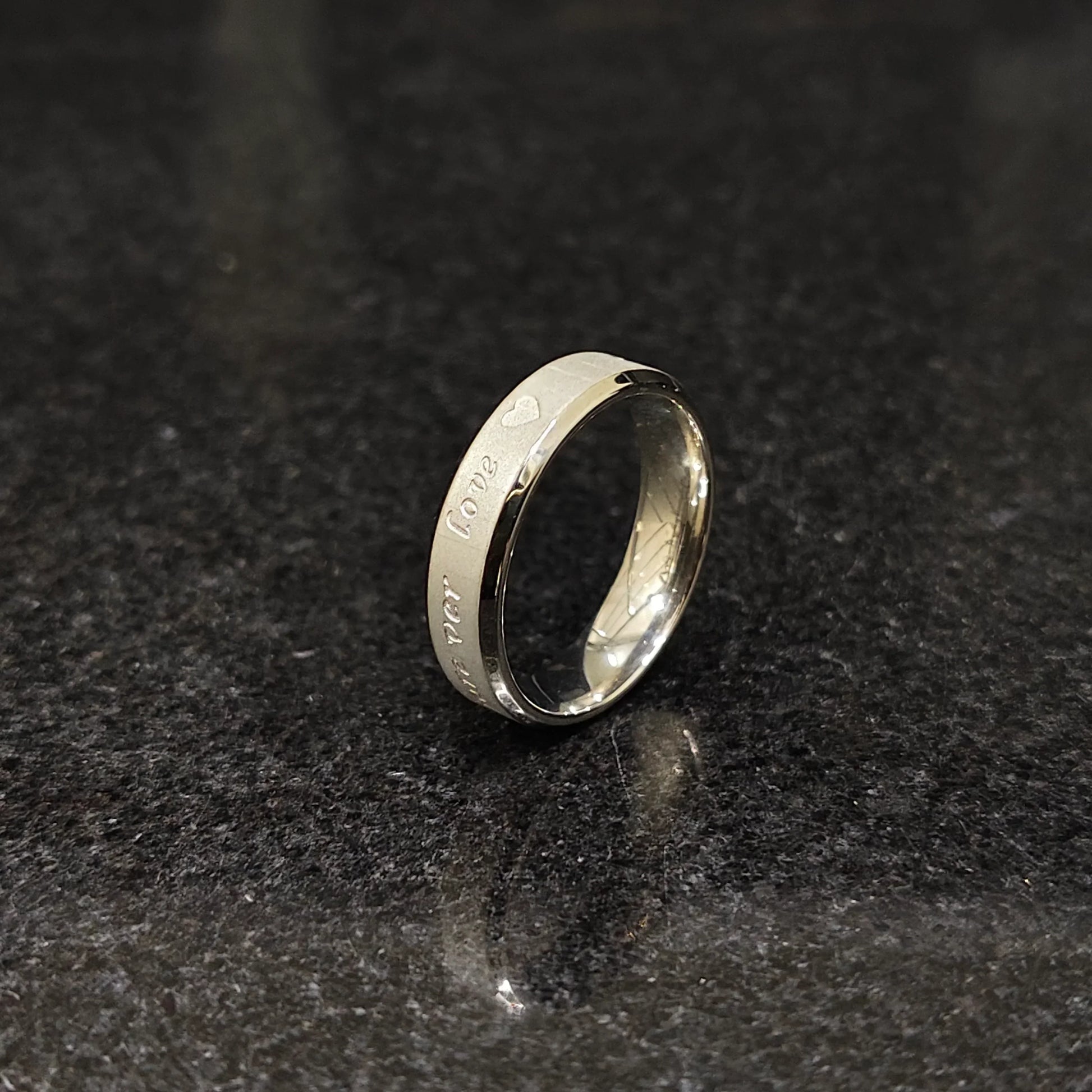 Lamha silver ring engraved with love text on black surface best ring for men in silver color