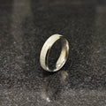 Lamha silver ring with engraved love text on black stone surface best ring for men in silver color