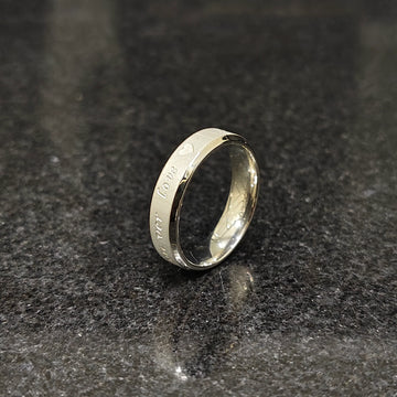 Lamha silver ring with engraved love text on black stone surface best ring for men in silver color