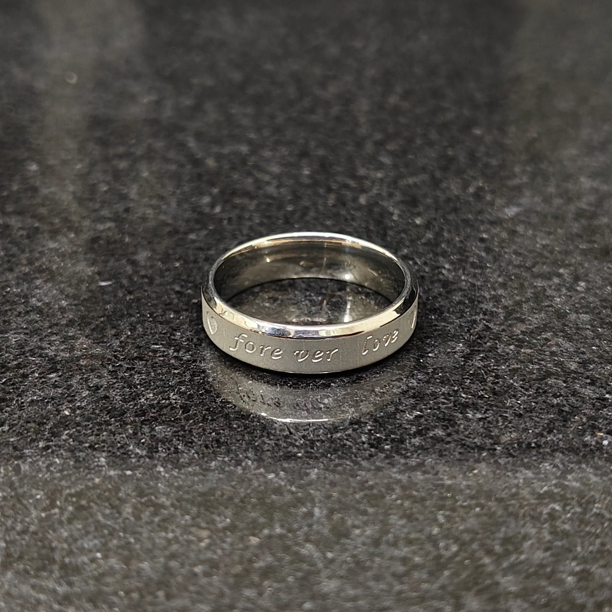 Best ring for men in silver color with engraved forever love text on smooth band by Lamha