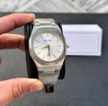 Bestwin Date Just Watch in Silver White held in hand with stainless steel band and minimalistic dial