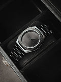 Black Arabic Aura Watch Stainless Steel with sleek black dial and unique Arabic numerals in a black display box