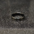Black roman ring in best design by Lamha with detailed Roman numeral engravings on dark surface