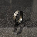 Black roman ring in best design engraved with Roman numerals on a dark textured surface