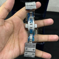 Lamha Cartier icedout Watch silver clasp with sparkling stones held in hand