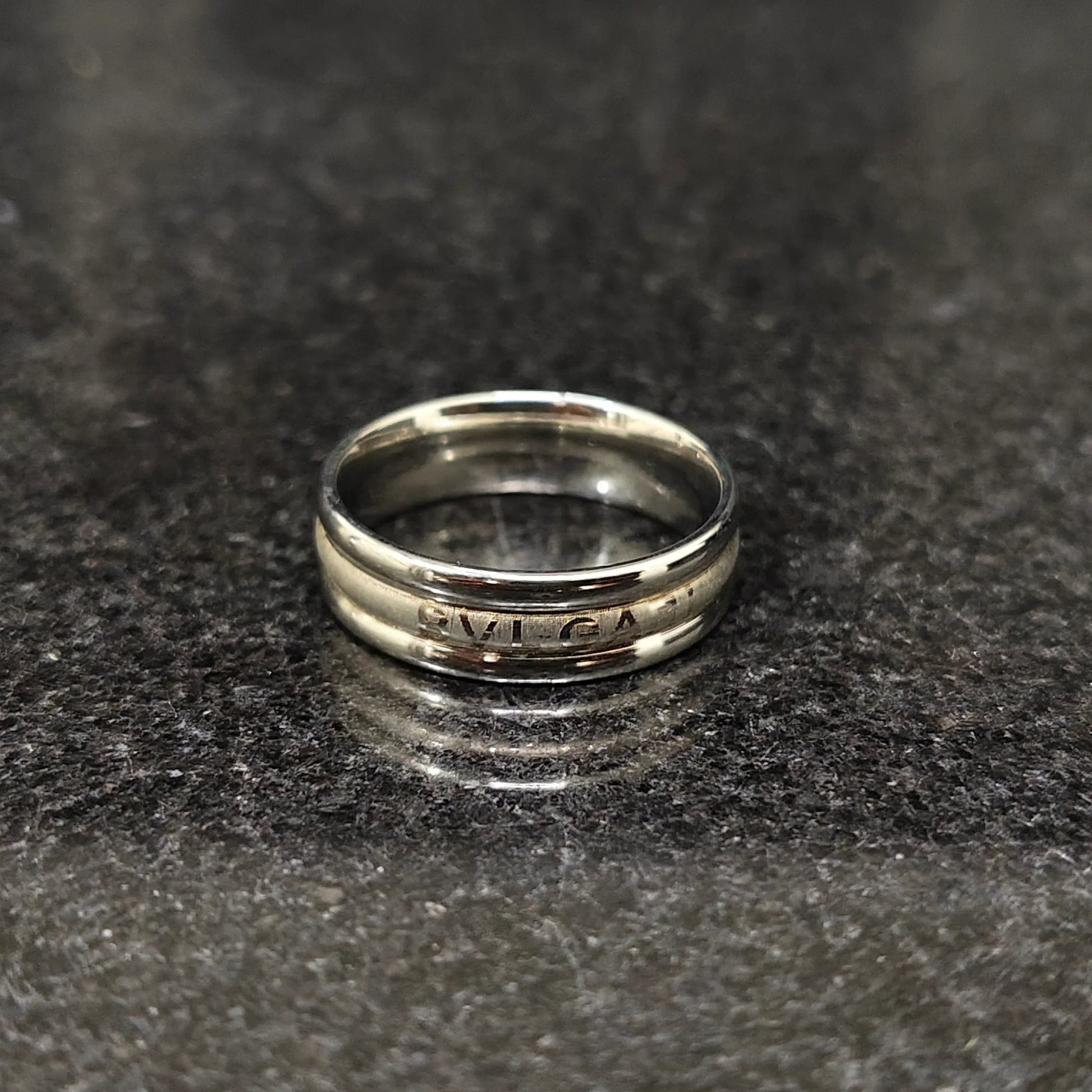 Ferrum ring for men in silver color in pakistan with sleek polished metal design by Lamha