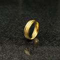 Ferrum ring in golden color in pakistan with polished smooth finish and detailed engravings by Lamha