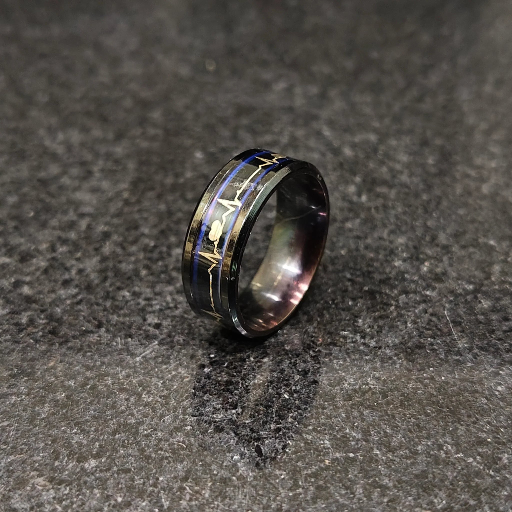 Lamha black metal ring with gold heartbeat design forever ring design for men in pakistan