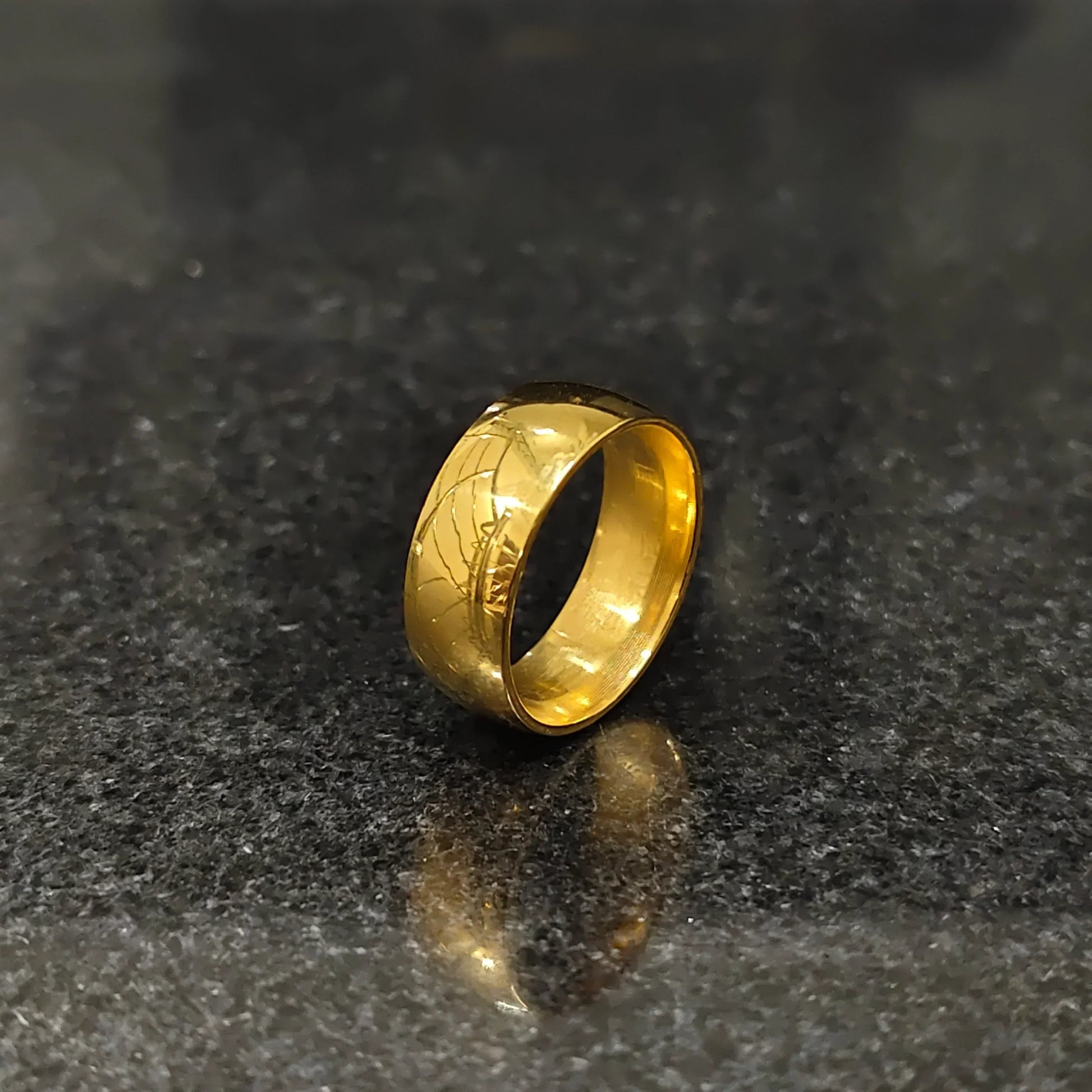 Golden ring for men in pakistan with smooth polished finish and subtle engraved design