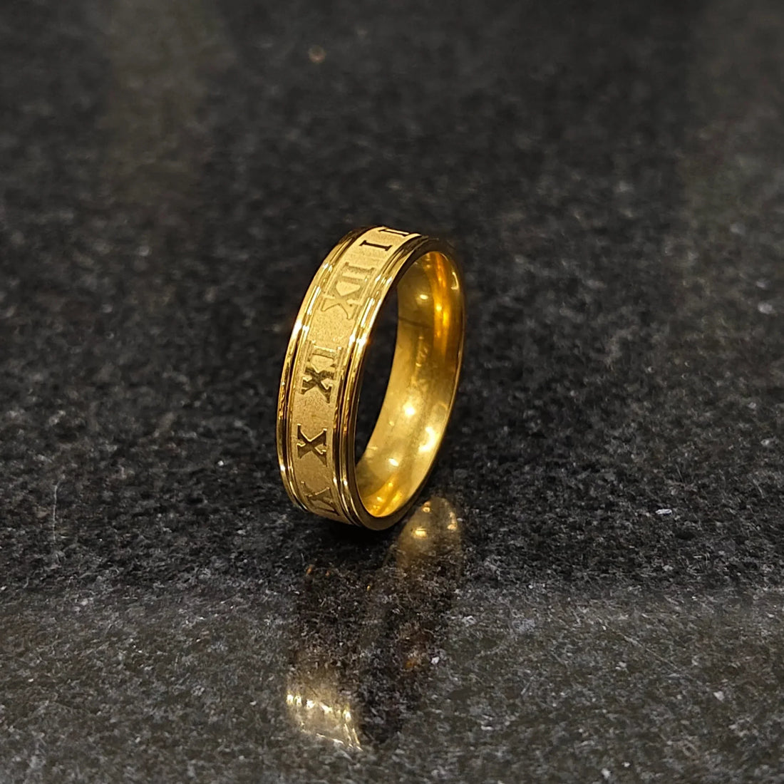 Golden Roman ring in best design with engraved Roman numerals on polished gold band