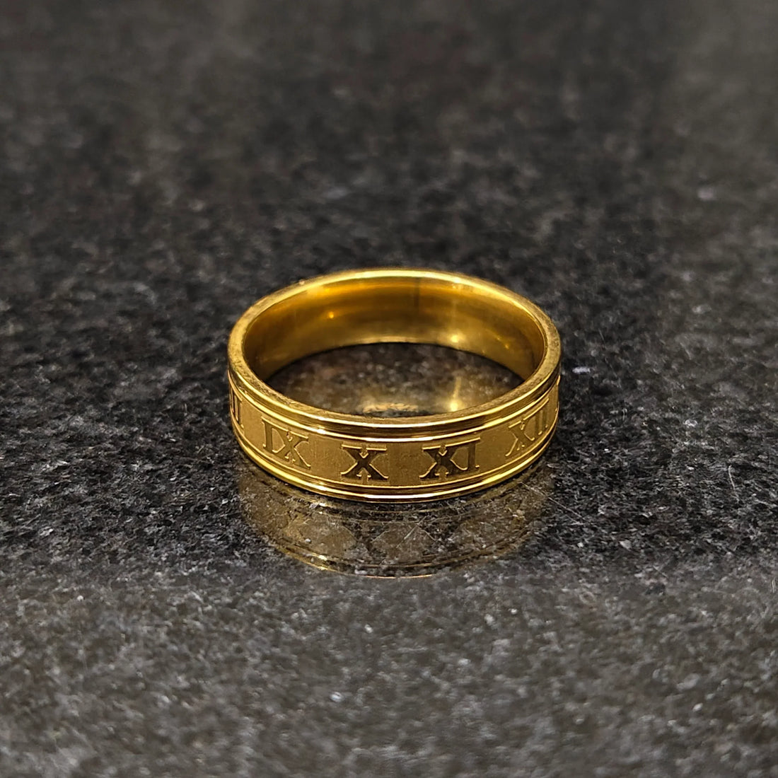 Golden Roman ring in best design with engraved Roman numerals on polished gold band