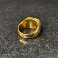 Golden Swiss medusa ring for men with intricate textured design in polished gold finish