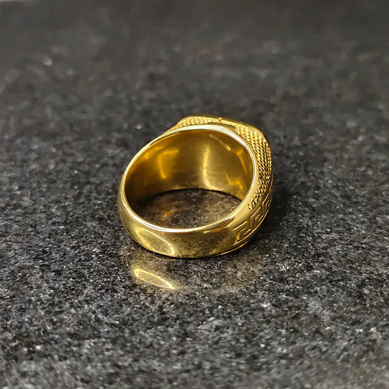 Golden Swiss medusa ring for men with intricate textured design in polished gold finish