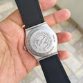 Back view of Lamha hub strap watch for men in pakistan with black strap and silver case