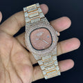 Patek Philippe Ice Dout rose gold Watch with diamond-studded band and face held in hand