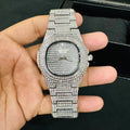 Lamha Patek Philppe Icedout silver watch fully encrusted with diamonds held in hand