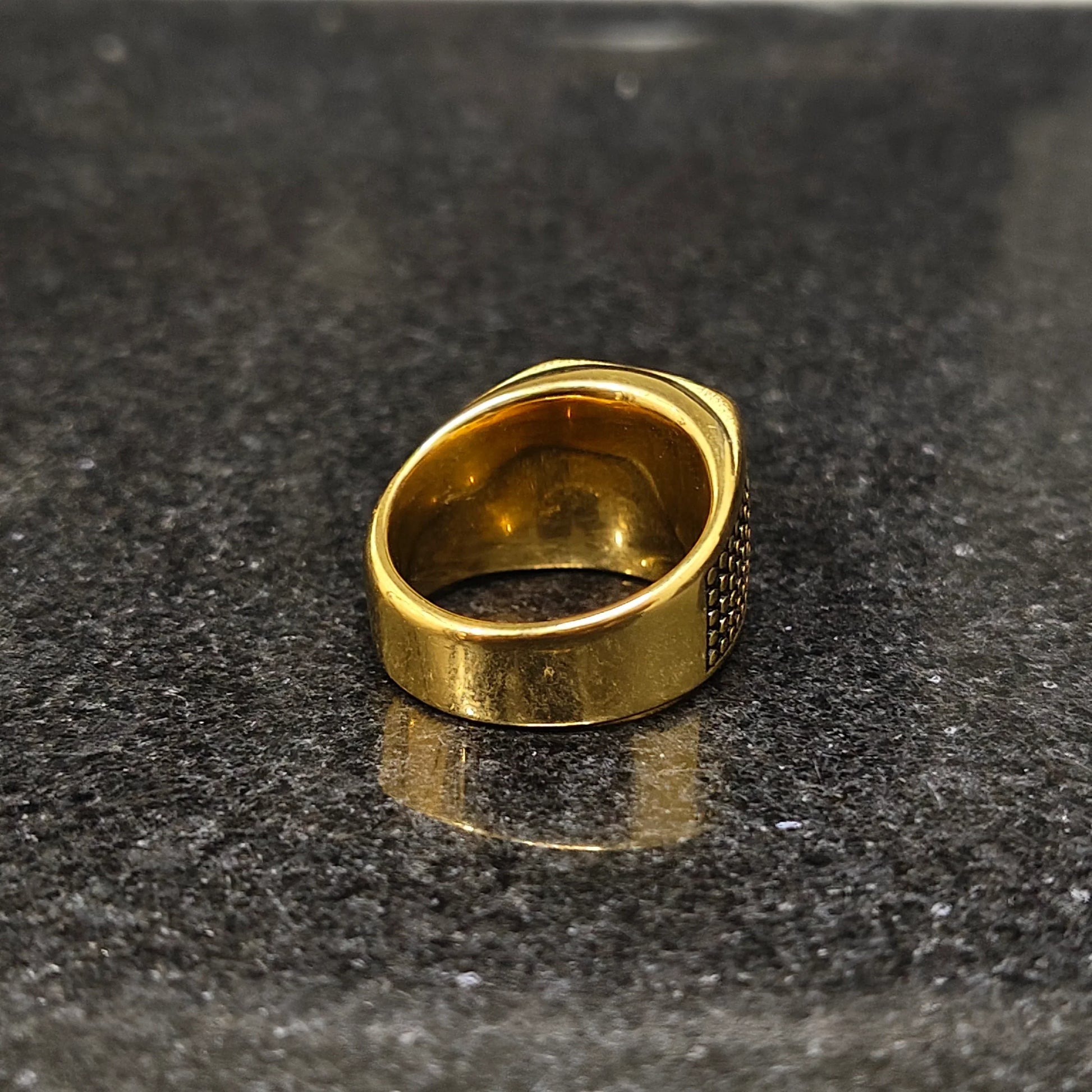 Lamha retro golden ring for men in best design with smooth finish on dark surface