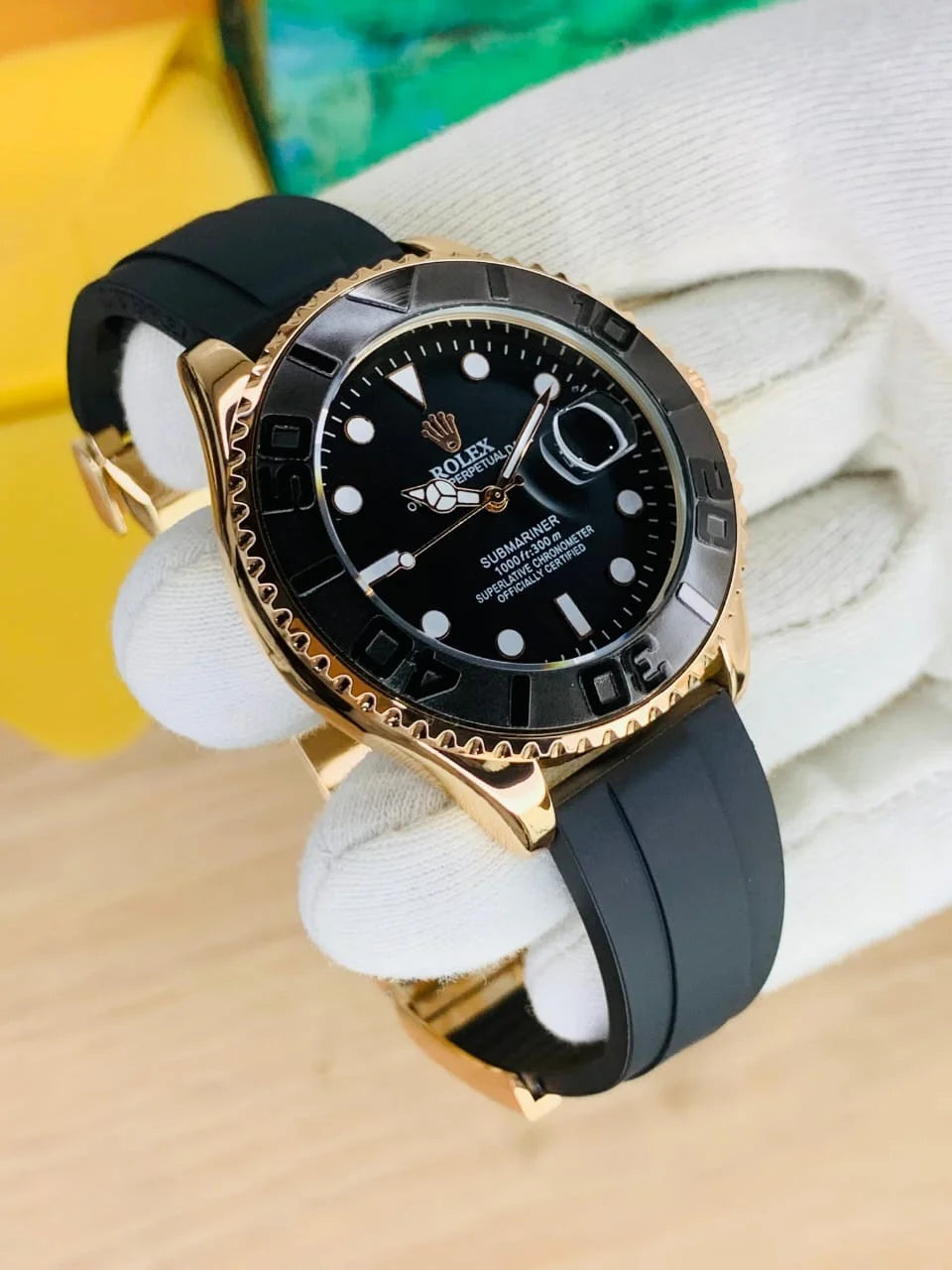 Rose gold black rolex watch for men with black dial and rubber strap by Lamha