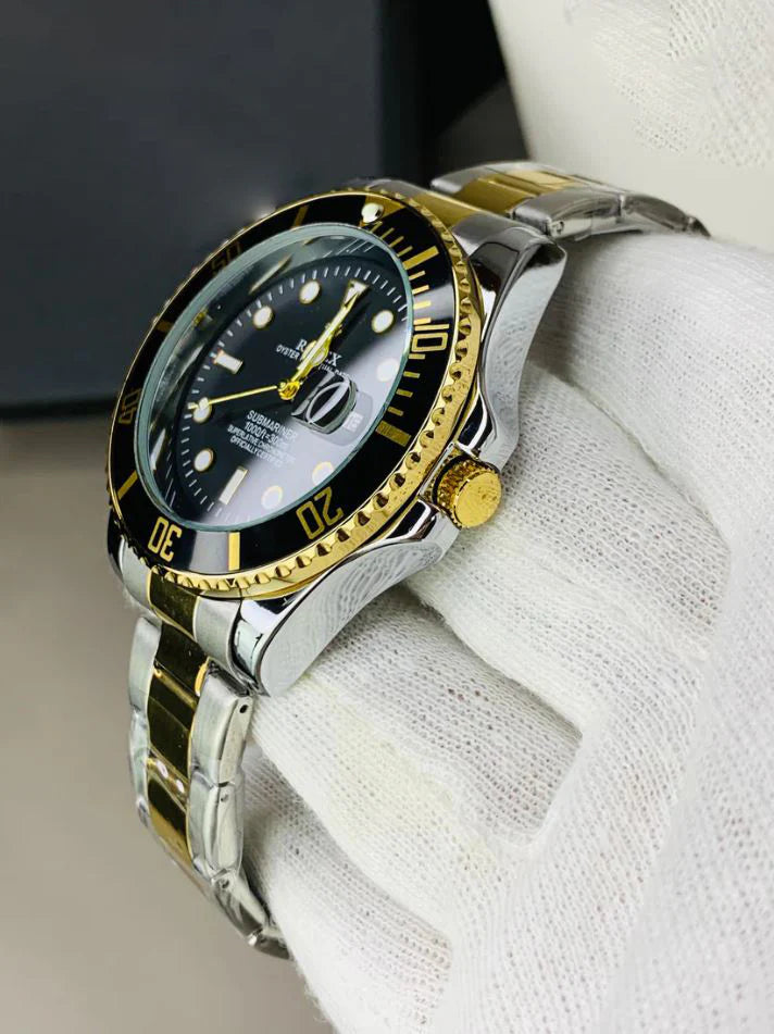 Rolex Submariner Date Watch Two Tone Black with gold and silver stainless steel band held on white glove