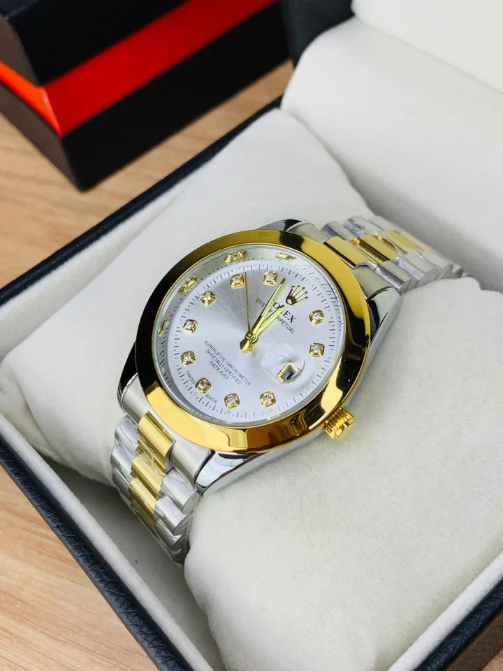 Rolex watch in stone in two tone with gold and silver bracelet held in white glove