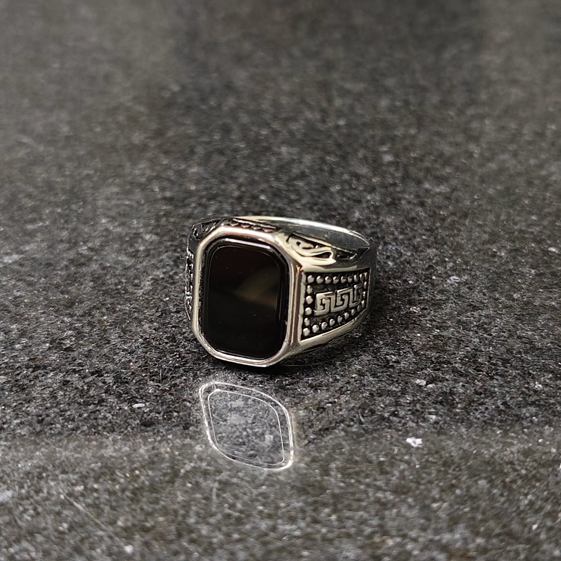 Lamha silver medusa ring for men with black rectangular stone and detailed side engravings