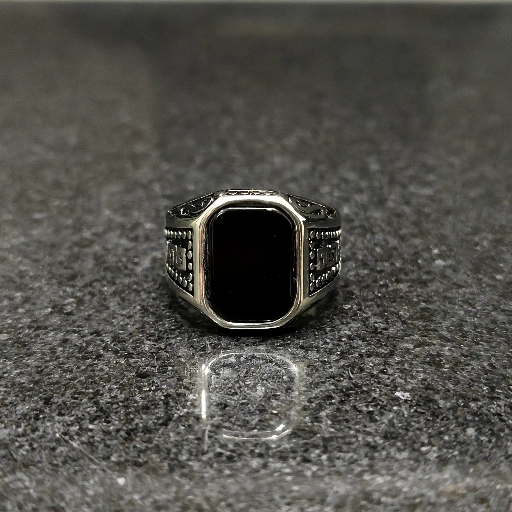 Lamha silver medusa ring for men with black rectangular stone and intricate side detailing
