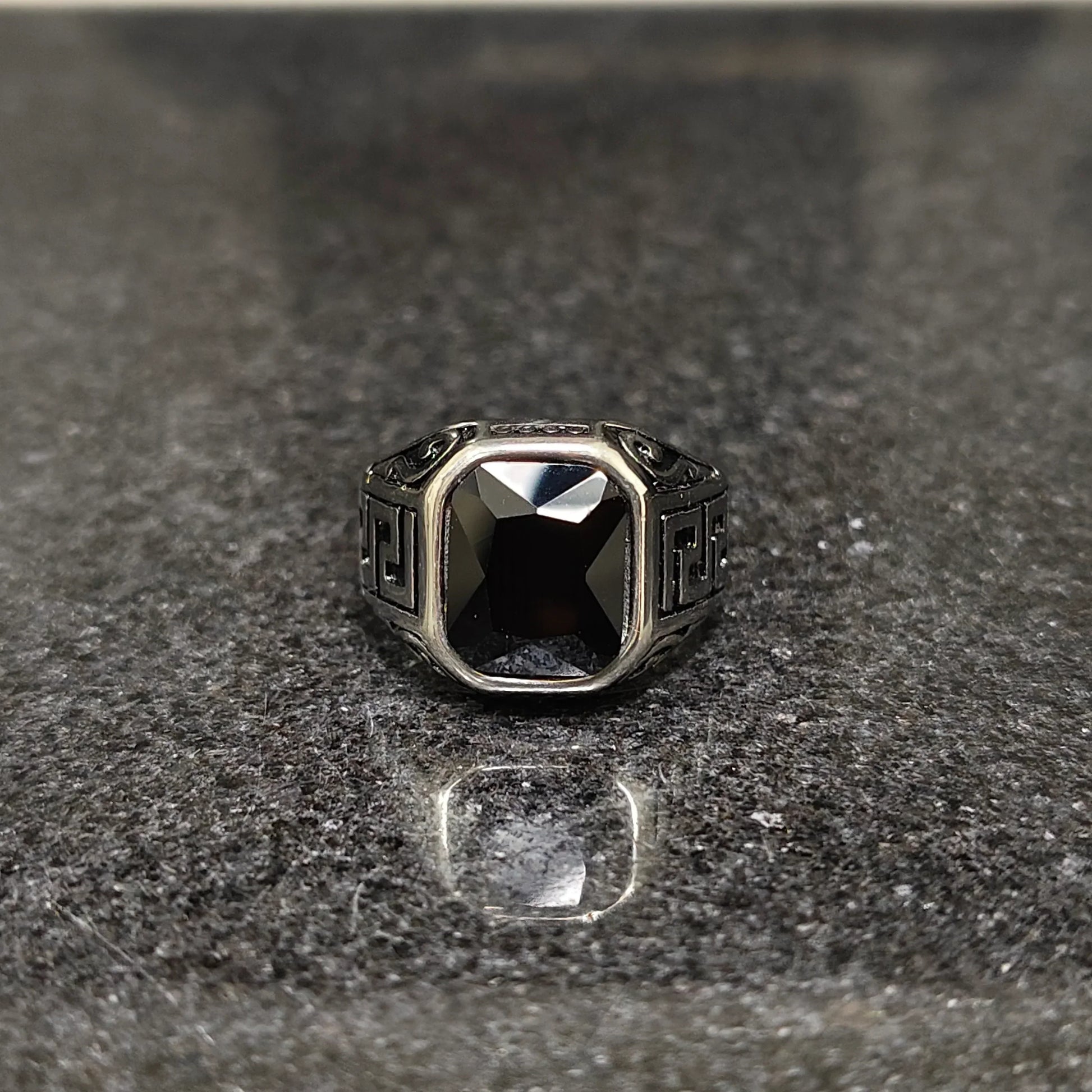 Silver onyx emperor ring for men with square black stone and intricate metalwork design