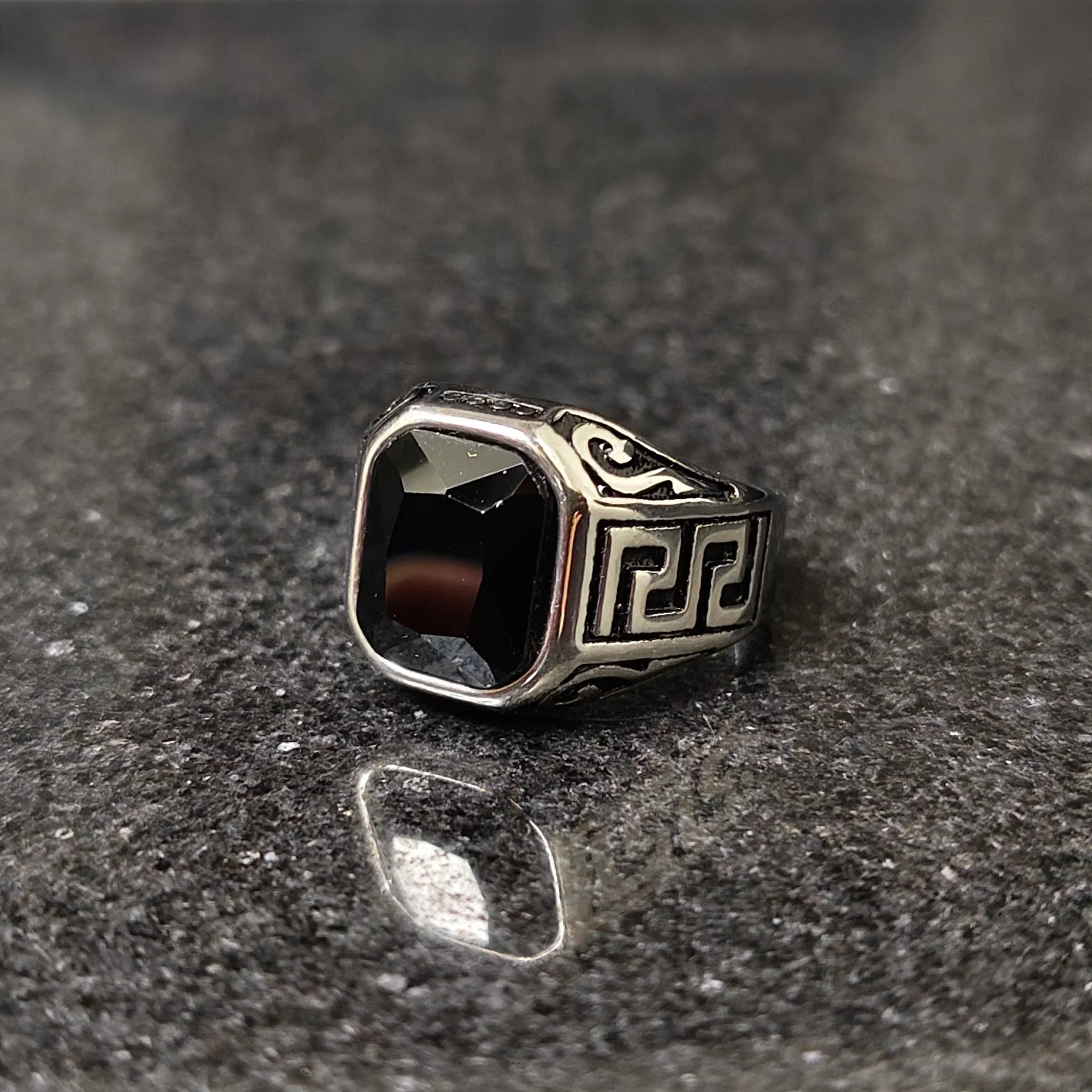 Silver onyx emperor ring for men with black rectangular stone and intricate side engravings