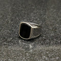 Silver retro ring for men with black rectangular stone and textured band by Lamha