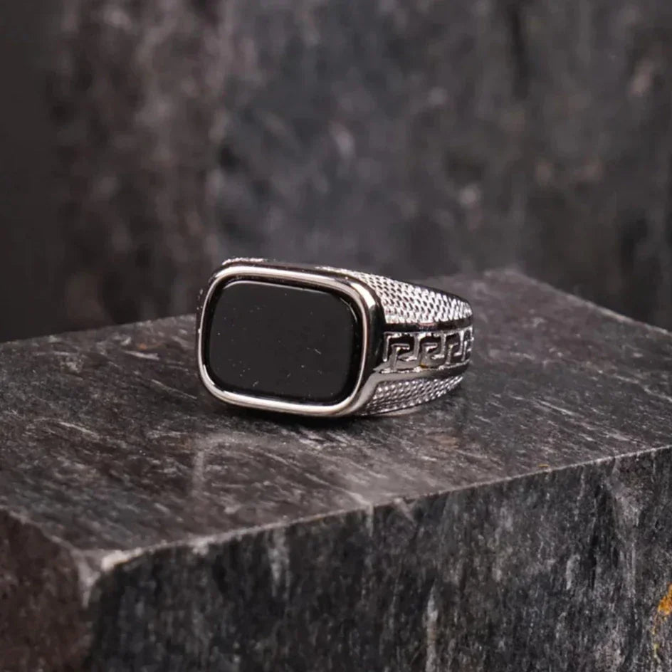 Silver Swiss Medusa Ring For Men with black rectangular stone and intricate band details