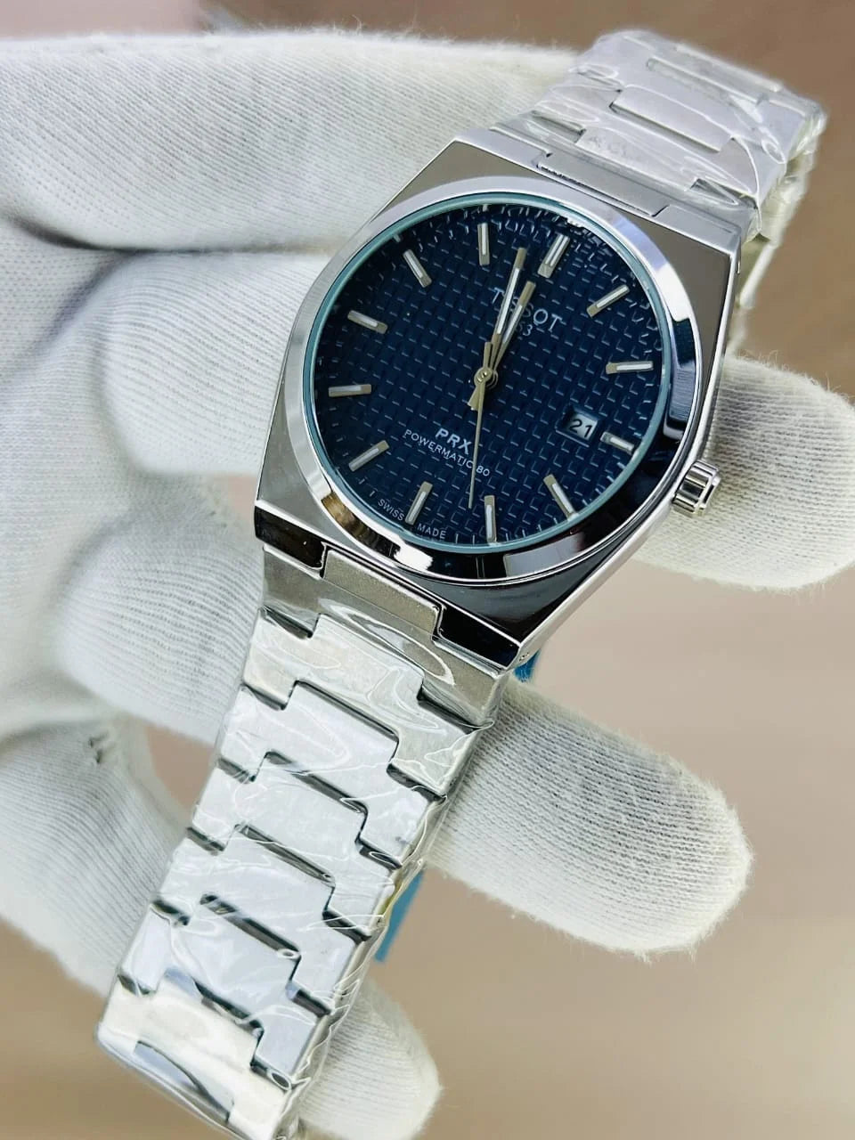 Tissot PRX Chain Watch in Silver Blue Color with stainless steel bracelet and textured blue dial