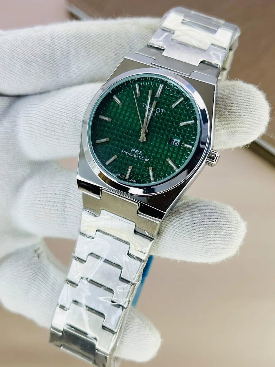 Tissot PRX Chain Watch in Silver Green featuring a textured green dial and stainless steel bracelet