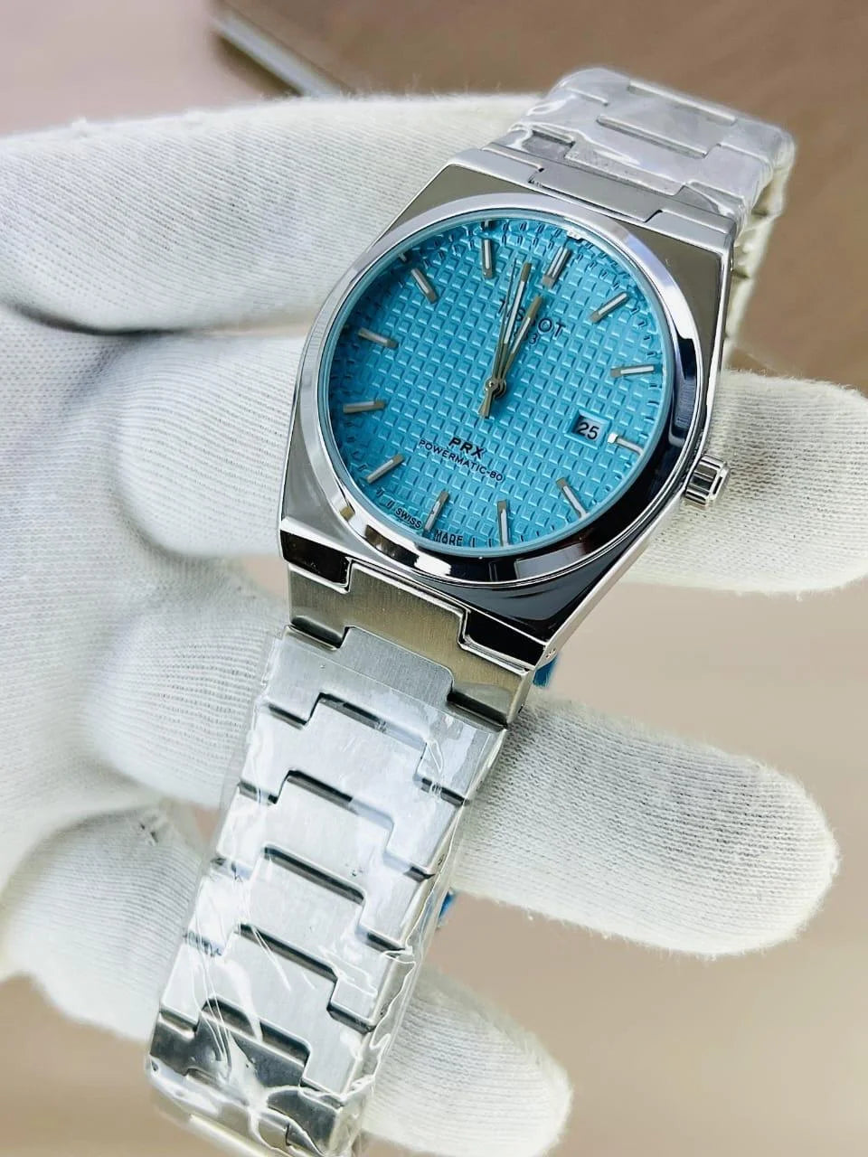 Tissot PRX Chain Watch in Silver Tiffny with textured blue dial and stainless steel bracelet