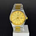 Tissot Prx Two Tone Watch In Gold with gold dial and silver and gold metal bracelet