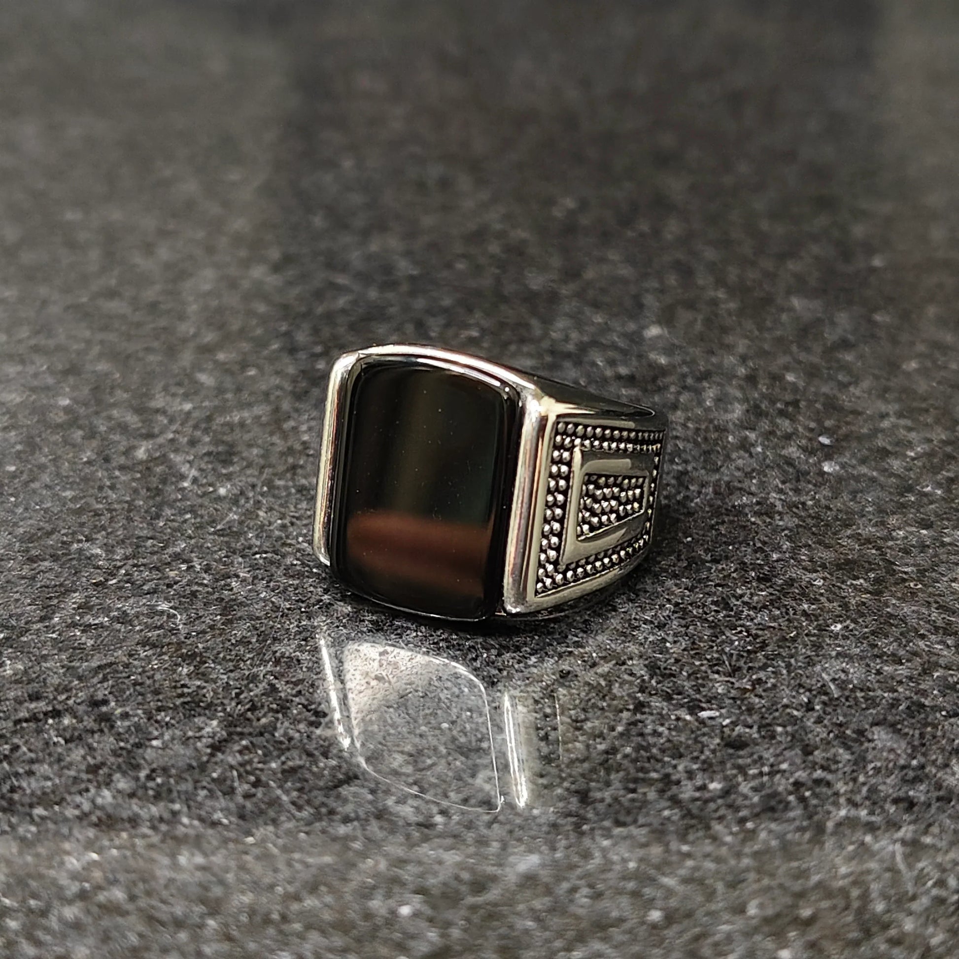 Silver Egyptian ring for men with black stone and intricate beaded side detailing