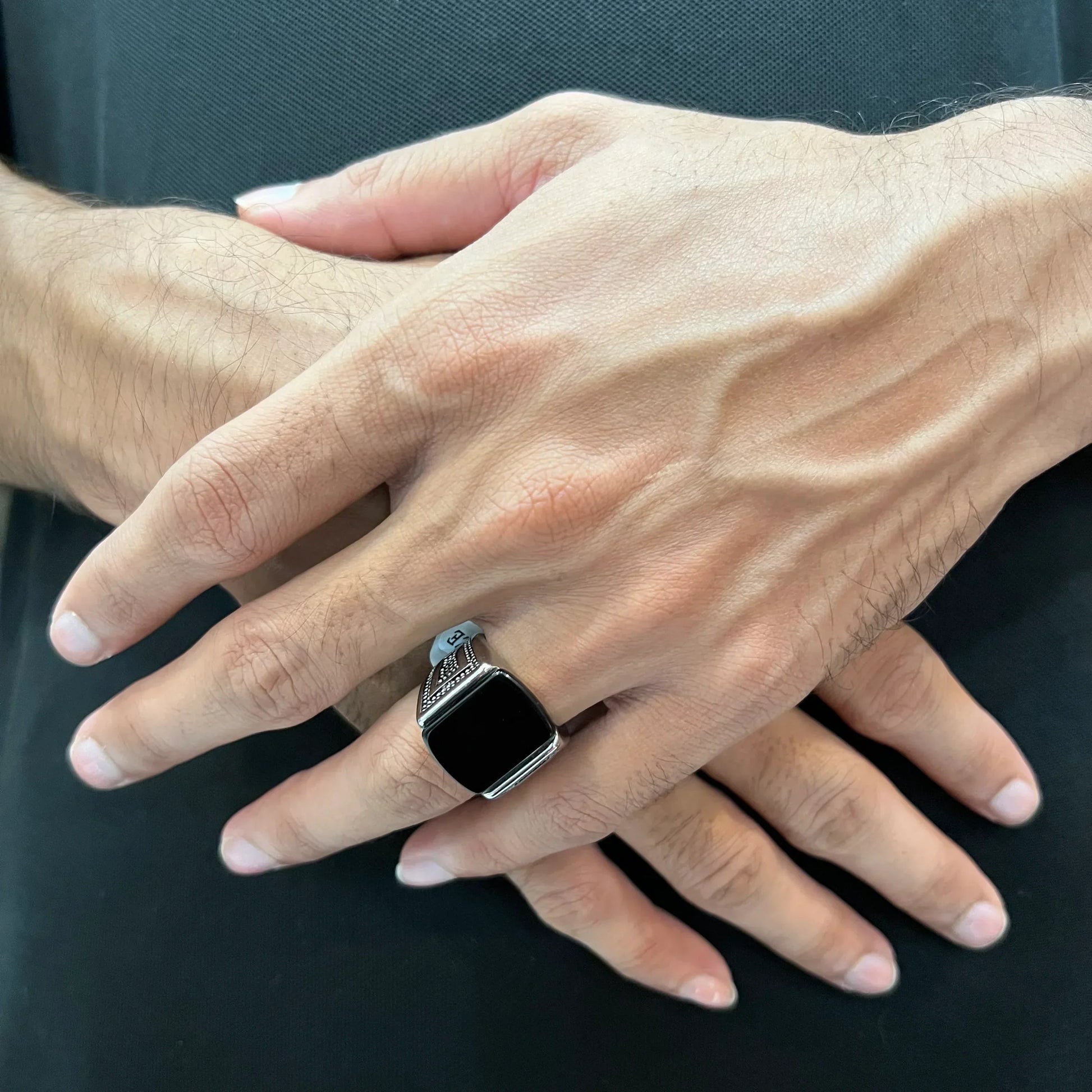 Silver Egyptian ring for men with black stone worn on hand by Lamha vendor