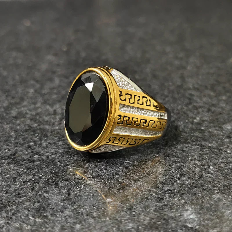 Silver gold oval medusa ring for men with black oval gemstone and intricate gold and silver patterns