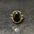 Silver gold oval medusa ring for men with a large black faceted stone centerpiece
