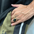Silver gold oval medusa ring for men worn on hand with black stone and intricate design